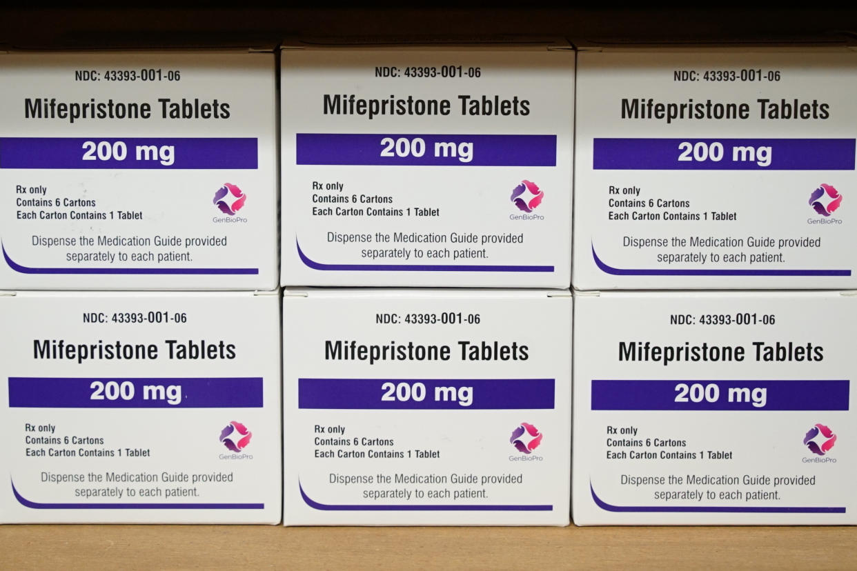 FILE - Boxes of the drug mifepristone sit on a shelf at the West Alabama Women's Center in Tuscaloosa, Ala., on March 16, 2022. A federal judge will hear arguments Wednesday, March 15, 2023, in a high-stakes court case that could threaten access to abortion medication and blunt the authority of U.S. drug regulators. (AP Photo/Allen G. Breed, File)