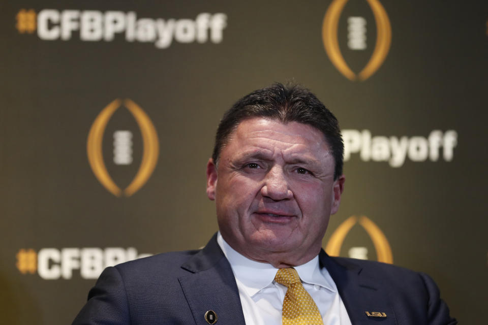 LSU head coach Ed Orgeron speaks during a news conference ahead for the College Football playoffs Thursday, Dec. 12, 2019, in Atlanta. Ryan Day of Ohio State was unable to attend. (AP Photo/John Bazemore)