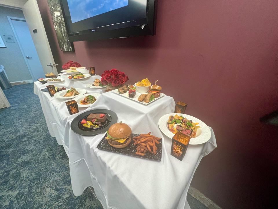 Display of Qatar Airways' business class meals.