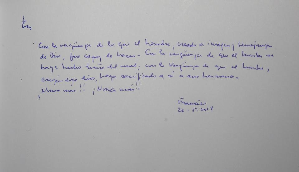 A message written by Pope Francis is seen in the Yad Vashem guest book after he attended a ceremony at the Yad Vashem Holocaust memorial in Jerusalem