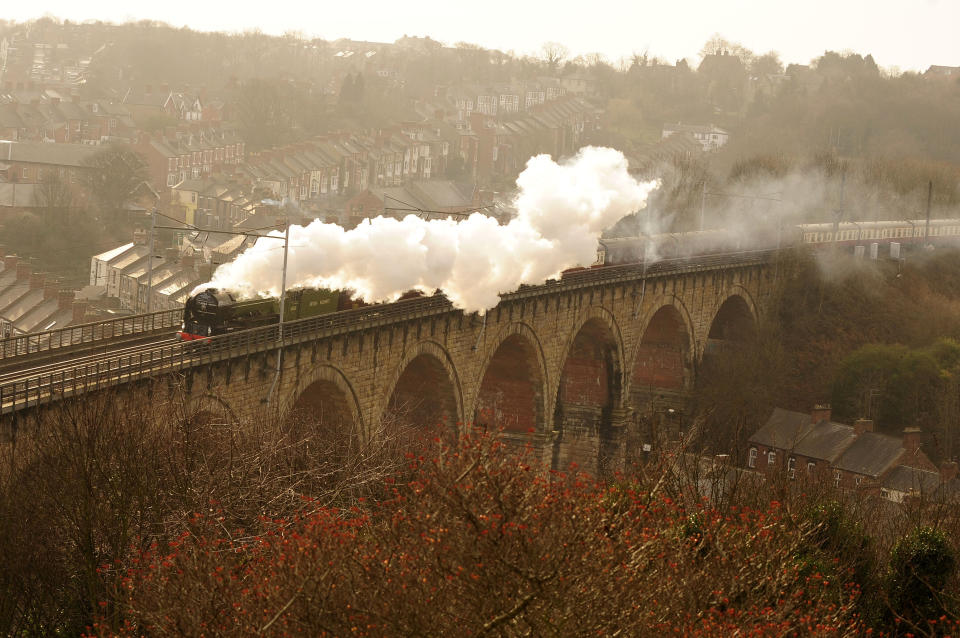 The Tornado Steam Locomotive is seen carrying her first passengers through Durham, northern England January 31, 2009.  The last of the Peppercorn class 'A1' steam  locomotives was scrapped in 1966, but this new locomotive, number 60163 Tornado, and built by the A1 Steam Locomotive Trust in Darlington, pulled her first passengers on the Network Rail main line from York to Newcastle-upon-Tyne on Saturday.         REUTERS/Nigel Roddis    (BRITAIN)