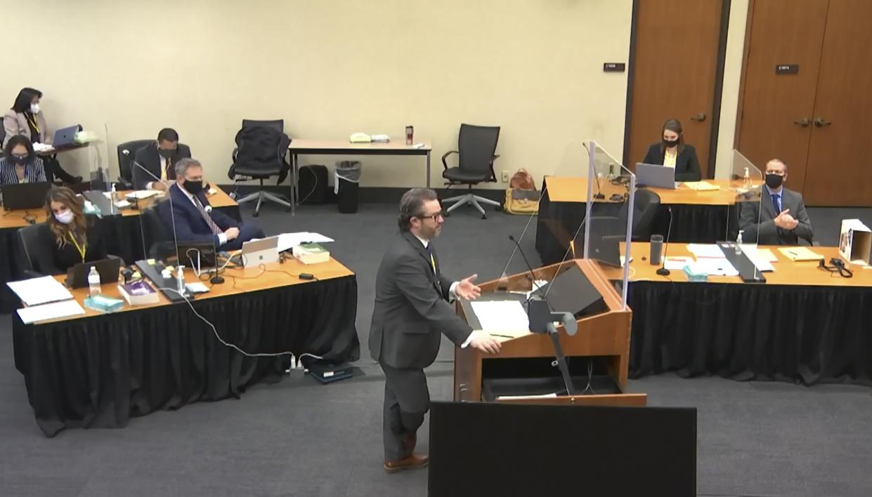 In this screen grab from video, defense attorney Eric Nelson speaks as Hennepin County Judge Peter Cahill presides over jury selection, Friday, March 19, 2021, in the trial of former Minneapolis police officer Derek Chauvin at the Hennepin County Courthouse in Minneapolis, Minn.  Chauvin is charged in the May 25, 2020 death of George Floyd. 