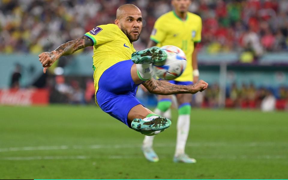 Dani Alves of Brazil takes a shot - Justin Setterfield/Getty Images