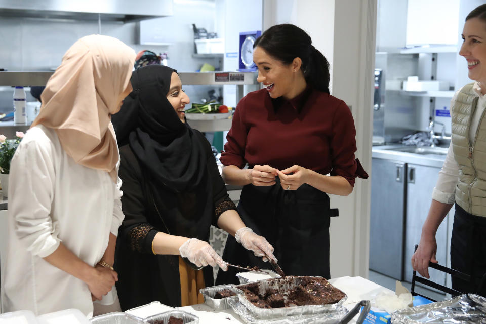 Meghan during a visit to the Hubb Community Kitchen in November 2018 [Photo: Getty]