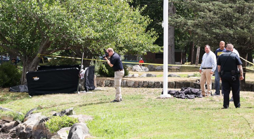 Police investigate after a body was pulled from Upper Porter Pond at D.W. Field Park in Brockton, on Sunday, Aug. 14, 2022.