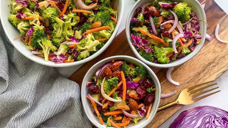 Colorful broccoli salad in bowls