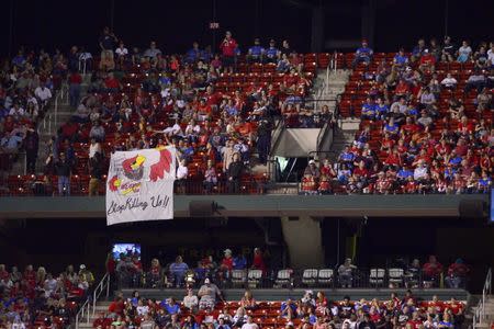 Sep 29, 2017; St. Louis, MO, USA; Protesters display a sign during the third inning of a game between the St. Louis Cardinals and the Milwaukee Brewers at Busch Stadium. Mandatory Credit: Jeff Curry-USA TODAY Sports