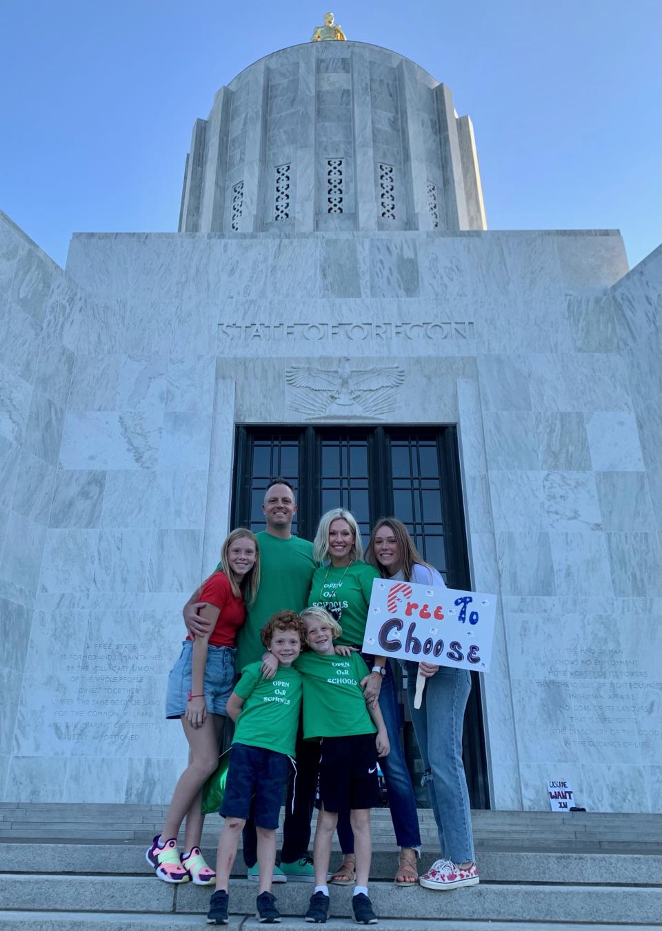 Shalyse Olson stands with her husband, Brian, and four children at the state capitol in Salem, Oregon during a rally.<span class="copyright">Courtesy of Shalyse Olson</span>