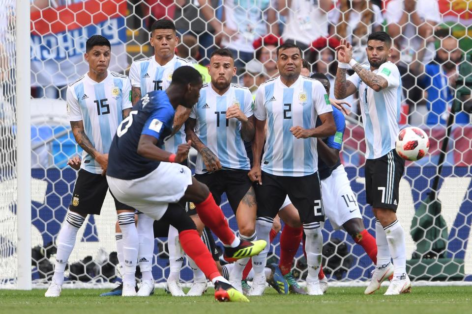 <p>Paul Pogba curls a free-kick over the Argentia crossbar in the first half. </p>