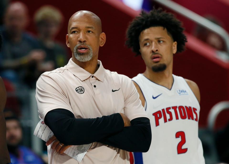 Detroit Pistons head coach Monty Williams and guard Cade Cunningham during the first half of a preseason game against the Phoenix Suns, Sunday, Oct. 8, 2023, in Detroit.