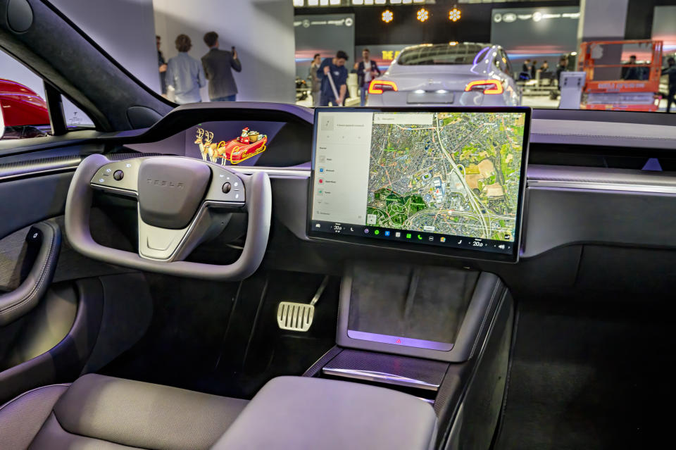 BRUSSELS, BELGIUM - JANUARY 13: Interior of a Tesla Model S full electric sedan with the yoke steering wheel and large touch screen on the dashboard at the Brussels Expo on January 13, 2023 in Brussels, Belgium.  (Photo by Sjoerd van der Wal/Getty Images)