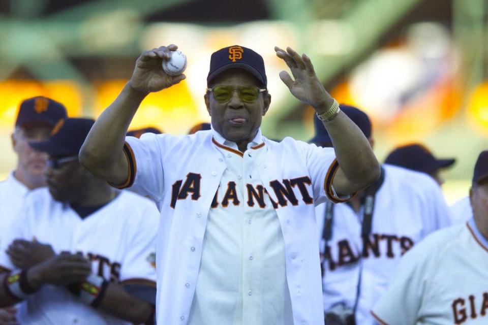 Giants great Willie May, who played for the team for 20 season and is considered the greatest baseball player of all time, gets ready to throw a ball before the start of a Sept. 30, 1999, game in San Francisco. The Hall of Famer center fielder and a slugging icon died Tuesday, June 18, 2024, at the age of 93, the Giants organization announced.