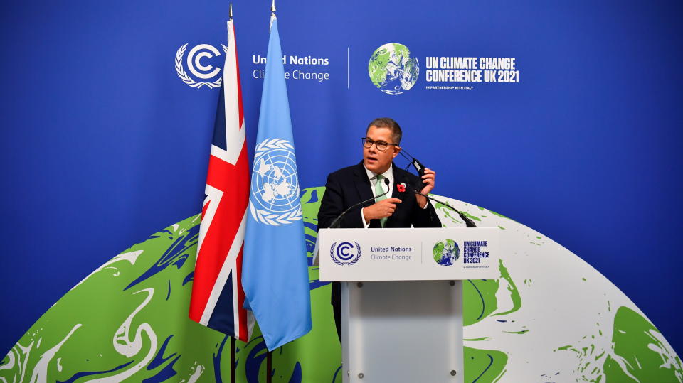 COP26 President Alok Sharma adjusts his mask during the UN Climate Change Conference (COP26) in Glasgow, Scotland, Britain November 13, 2021. REUTERS/Dylan Martinez