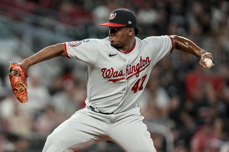 Washington Nationals relief pitcher Jose Ferrer (47) works on the mound against the Atlanta Braves during fifth inning of an baseball game, Friday, Sept. 29, 2023, in Atlanta. (AP Photo/Mike Stewart)
