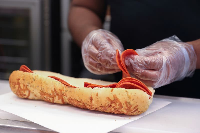 FILE PHOTO: A sub is prepared at a Subway restaurant in Manhattan, New York City