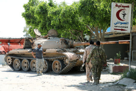 Members of Libyan internationally recognised government forces are seen in Al-Swani area in Tripoli, Libya April 18, 2019. REUTERS/Ahmed Jadallah