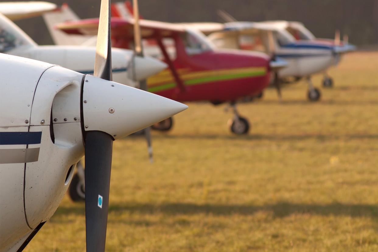 Row of planes' propellers at autumn sunset; Shutterstock ID 129919190; a: -; b: -; c: -; d: -