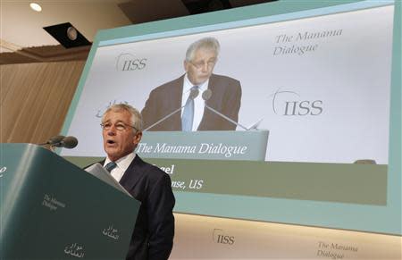 U.S. Defense Secretary Chuck Hagel speaks at the IISS Regional Security Summit - The Manama Dialogue, in Manama, December 7, 2013.REUTERS/Hamad I Mohammed