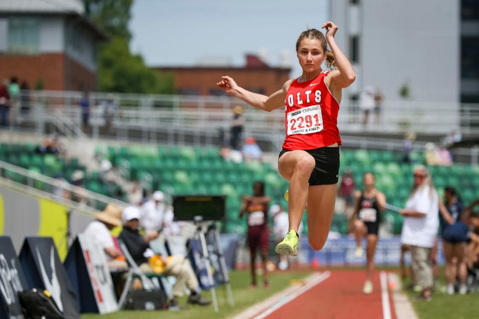 Thurston’s Breanna Raven takes off in the 5A long jump at the OSAA state track and field championship at Hayward Field in Eugene Saturday, May 27, 2023.