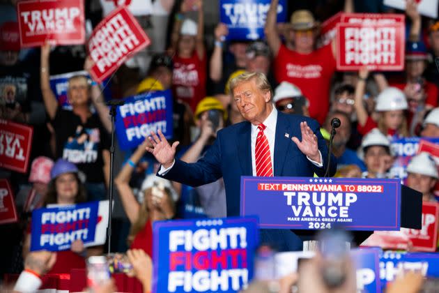 Former US President and Republican presidential candidate Donald Trump gestures as he speaks during a rally at 1st Summit Arena at the Cambria County War Memorial in Johnstown, Pennsylvania, on August 30, 2024. 