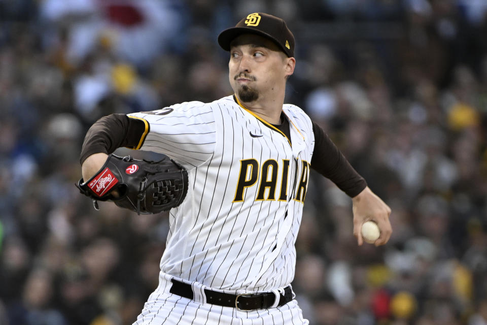 San Diego Padres starting pitcher Blake Snell throws to a Colorado Rockies batter during the first inning of a baseball game in San Diego, Thursday, March 30, 2023. (AP Photo/Alex Gallardo)