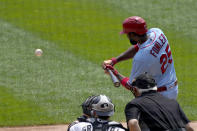 St. Louis Cardinals' Dexter Fowler swings into a two-run single off Chicago White Sox starting pitcher Lucas Giolito, during the first inning in Game 1 of a double-header baseball game Saturday, Aug. 15, 2020, in Chicago. (AP Photo/Charles Rex Arbogast)