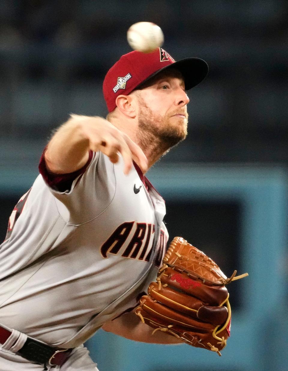 Arizona Diamondbacks starting pitcher Merrill Kelly (29) throws to the Los Angeles Dodgers in the fourth inning during Game 1 of the NLDS at Dodger Stadium in Los Angeles on Oct. 7, 2023.