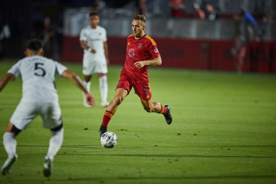 Jun 4, 2022; Chandler, AZ, USA; Phoenix Rising midfielder Santi Moar (7) runs the ball against the Birmingham Legion at Phoenix Rising FC Stadium. Mandatory Credit: Alex Gould/The Republic