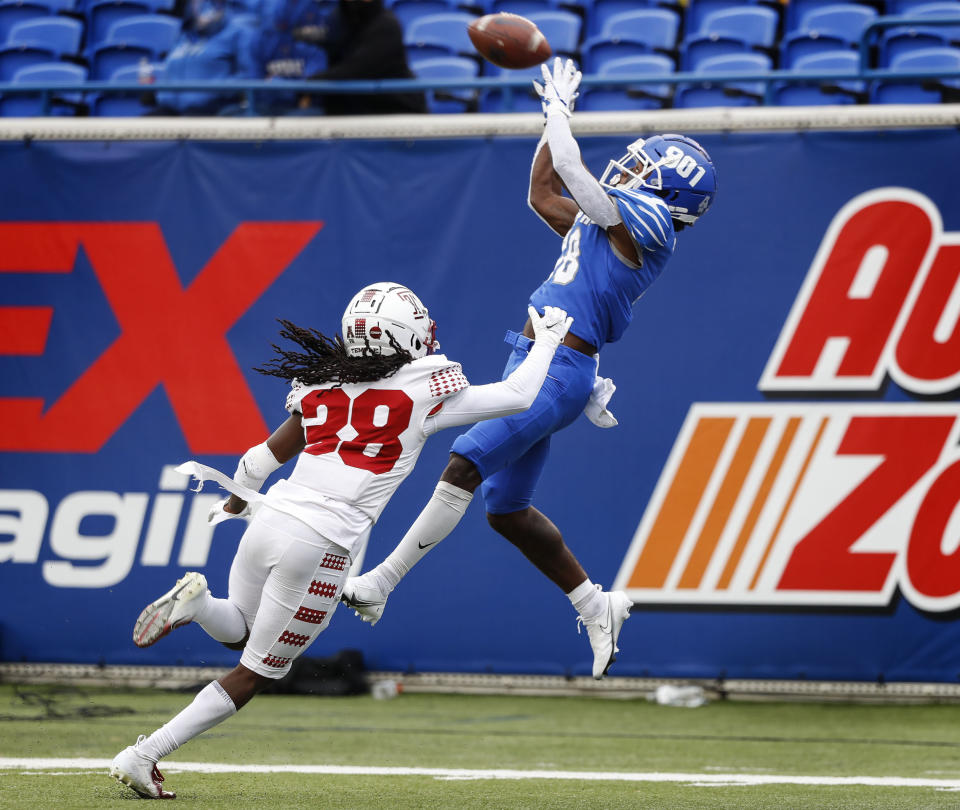 Memphis receiver Tahj Washington, right, hauls in a touchdown catch against Temple defender Aaron Adu, left, during an NCAA college football game Saturday, Oct. 24, 2020, in Memphis, Tenn. (Mark Weber/Daily Memphian via AP)