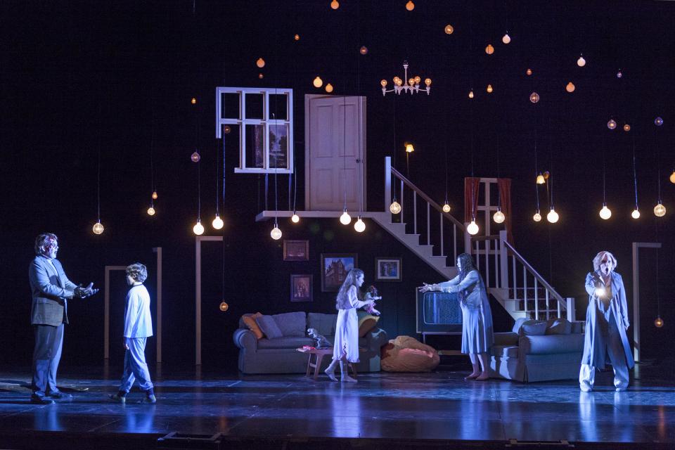 In this Feb. 22, 2013 photo provided by the New York City Opera, cast members perform during a dress rehearsal by the New York City Opera of “The Turn of the Screw,” at the Brooklyn Academy of Music in New York. From left are Dominic Armstrong as Peter Quint; Benjamin P. Wenzelberg as Miles; Lauren Worsham as Flora; Jennifer Goode Cooper as Miss Jessel and Sara Jakubiak as the Governess. (AP Photo/New York City Opera, Richard Termine)