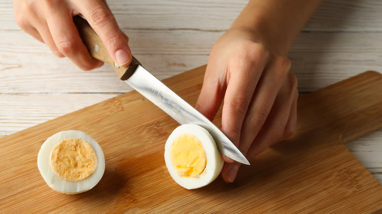 hard-boiled egg being sliced