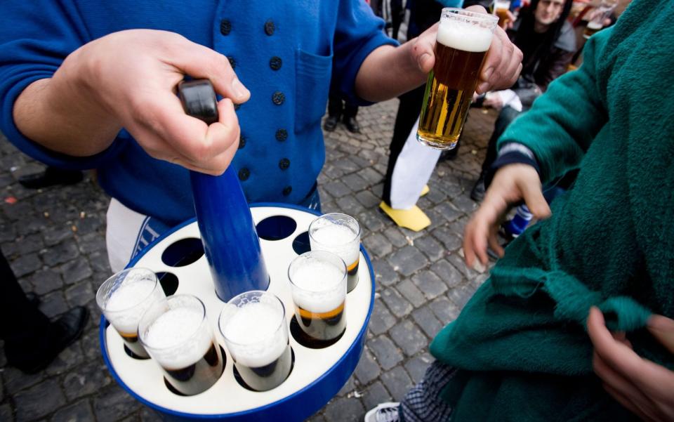 A barman serves Kolsch