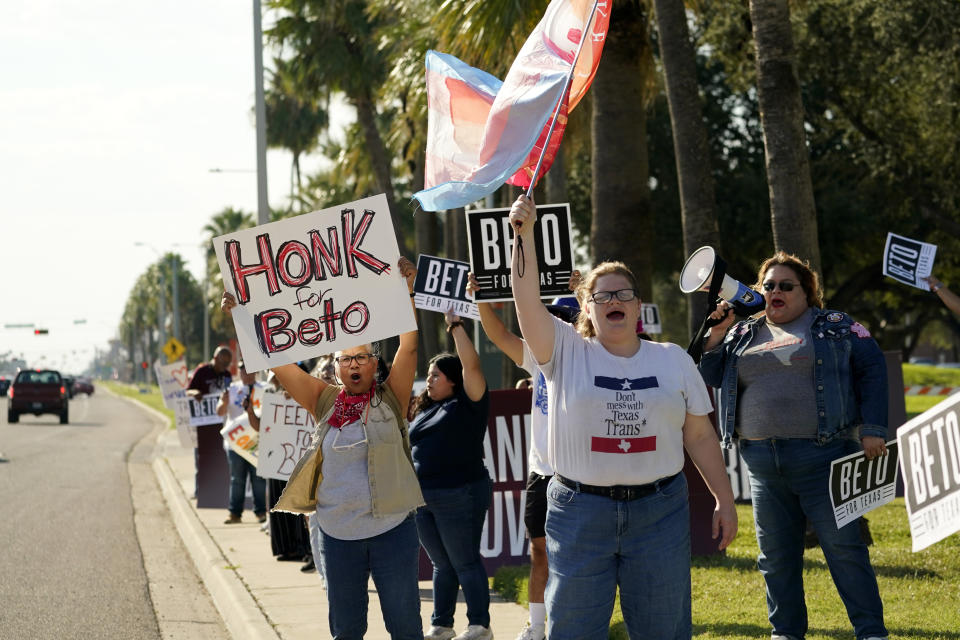 Supporters of Texas Democratic gubernatorial candidate Beto O'Rourke cheer outside the site of his debate with Texas Gov. Greg Abbott, Friday, Sept. 30, 2022, in Edinburg, Texas. As Democrats embark on another October blitz in pursuit of flipping America's biggest red state, Republicans are taking a swing of their own: Making a play for the mostly Hispanic southern border on Nov. 8 after years of writing off the region that is overwhelmingly controlled by Democrats. (AP Photo/Eric Gay)