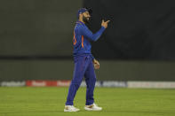India's Virat Kohli reacts after a misfield during the first one-day international cricket match between India and New Zealand in Hyderabad, India, Wednesday, Jan. 18, 2023. (AP Photo/Mahesh Kumar A.)