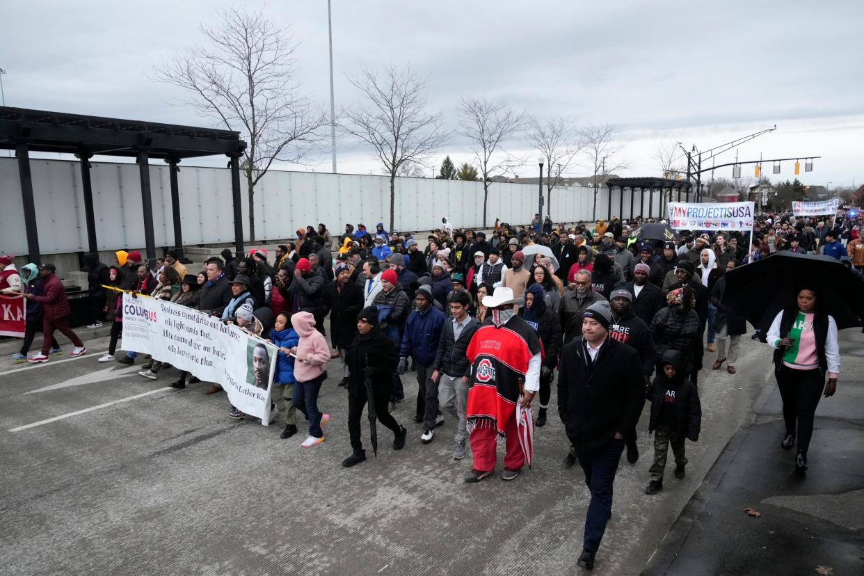 Hundreds walk in the MLK Day march in 2023. This year's march was canceled due to extreme cold.