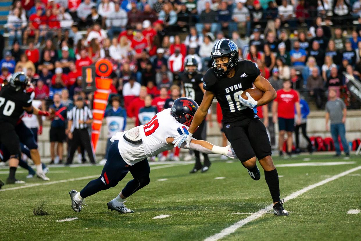 GVSU's Cody Tierney takes the ball for a gain of yards during the Laker's 29-10 win over Saginaw Valley Saturday, Oct. 1, 2022, at Lubbers Stadium. 