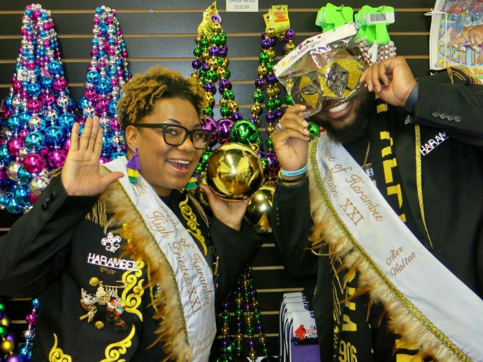 Krewe of Harambee XXI High Priestess Alexandra Stewart and Chieftain Alex Walton check out the Bead Room during the Centaur Royalty Mixer at the Centaur Den.