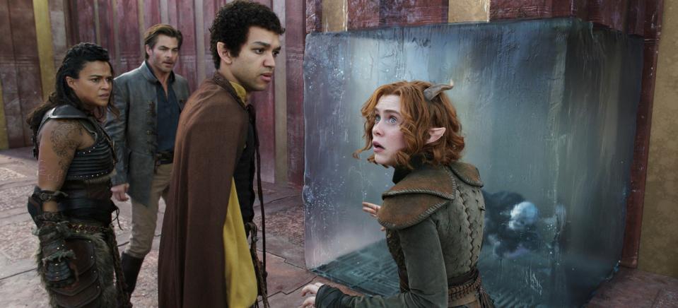 Chris Pine, Michelle Rodriguez, Justice Smith and Sophia Lillis gather near a strange translucent cube