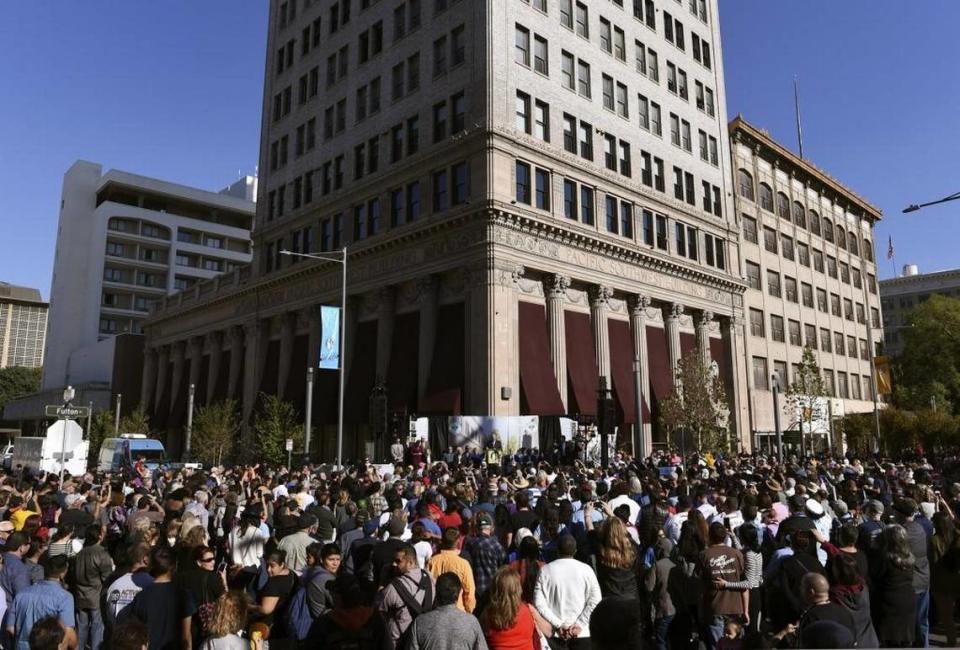 A large crowd gathered for speeches as part of ceremonies surrounding Fulton Street’s official reopening to vehicle traffic Saturday, Oct. 21, 2017.