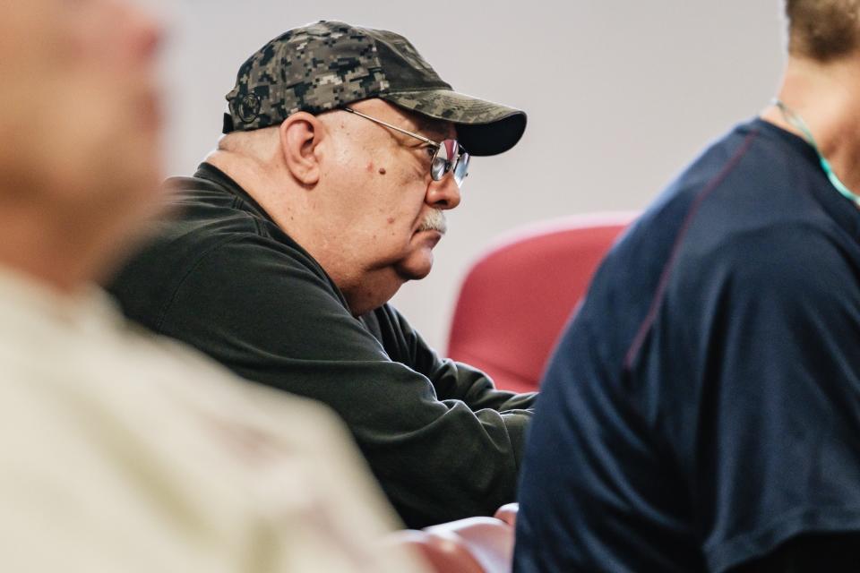 Joseph Huffman, a lifelong resident of Dover as well as landlord of multiple properties, listens during a public hearing about the Crimson Cove housing development before the City of Dover Planning Commission.