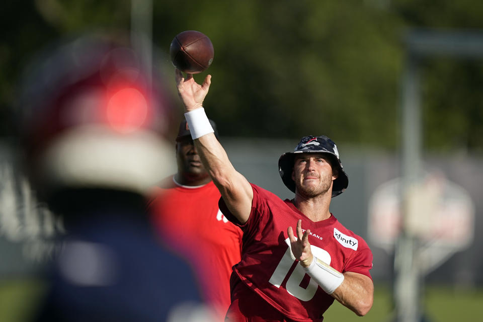 Houston Texans quarterback Davis Mills (10) throws a pass during an NFL football training camp practice Saturday, July 30, 2022, in Houston. (AP Photo/David J. Phillip)