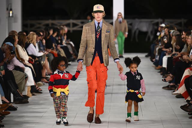 <p>ANGELA WEISS/AFP via Getty </p> E.J. and her fellow models walk the runway during the Ralph Lauren Spring 2025 collection runway show in Bridgehampton, New York on September 5, 2024