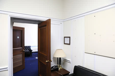 The now-vacated offices of outgoing U.S. Representative Dana Rohrabacher (R-CA) sit empty in the weeks before the end of his term, as dozens of outgoing and incoming members of Congress move into and out of Washington as votes on a potential federal government shutdown loom, on Capitol Hill in Washington, U.S., December 17, 2018. REUTERS/Jonathan Ernst
