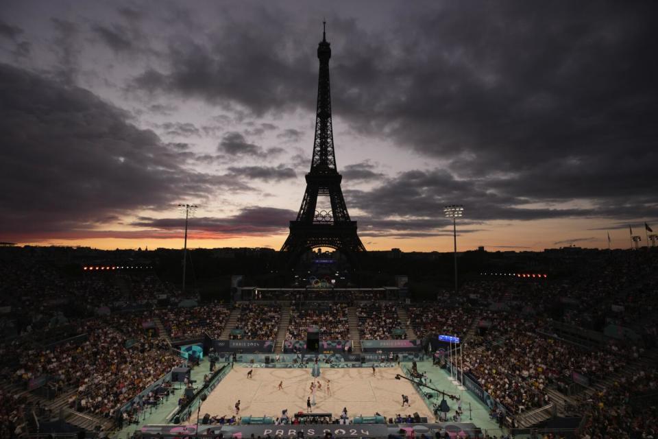 The Eiffel Tower is seen in the background during play in