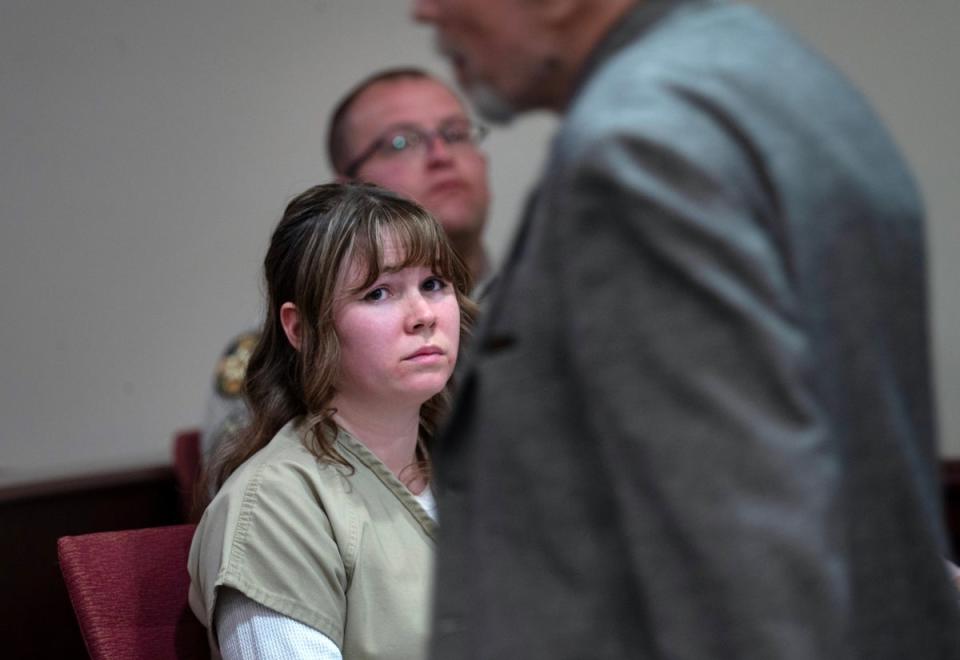 Hannah Gutierrez Reed watches her father Thell Reed leave the podium after he asked the judge not to impose prison time on his daughter in First District Court on 15 April 2024, in Santa Fe, New Mexico (Getty Images)