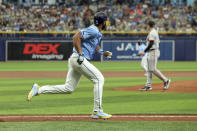 Tampa Bay Rays' Amed Rosario watches his home run off San Francisco Giants starting pitcher Blake Snell during the first inning of a baseball game Sunday, April 14, 2024, in St. Petersburg, Fla. (AP Photo/Mike Carlson)
