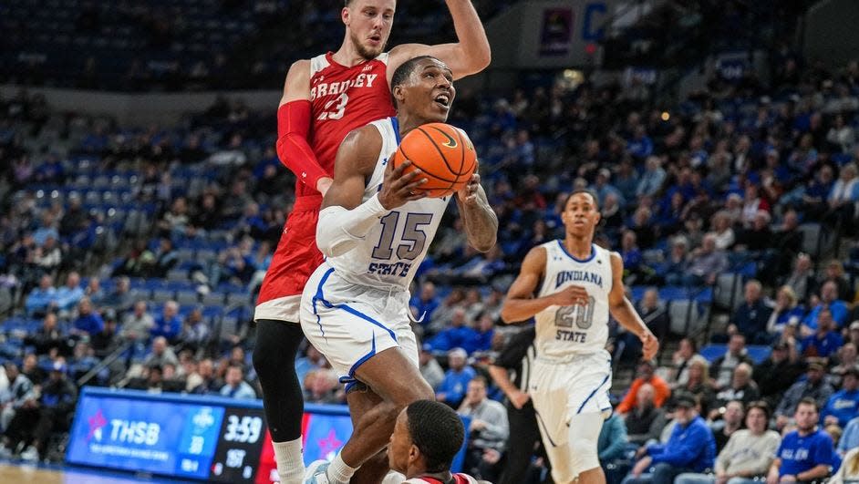 Bradley guard Ville Tahvanainen soars in a bid to stop Indiana State guard Cameron Henry during the Braves 78-67 win at Hulman Center in Terre Haute, Ind., on Wednesday, Jan. 18, 2023.