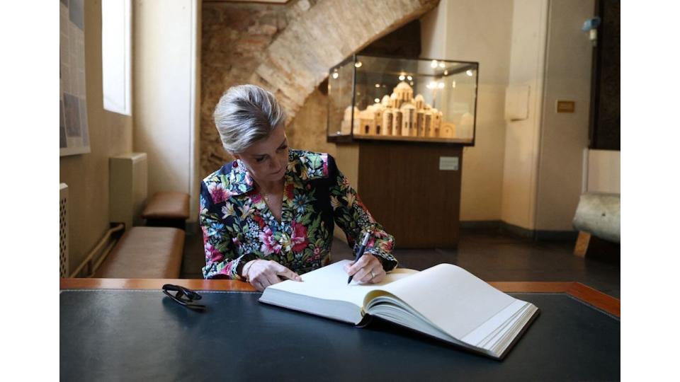 Duchess of Edinburgh Sophie signs the guests book as she visits the Saint Sophia Cathedral in Kyiv on April 29, 2024 amid the Russian invasion of Ukraine. The visit, to demonstrate solidarity with the women, men and children impacted by the war, is a continuation of her work to champion survivors of conflict related sexual violence.