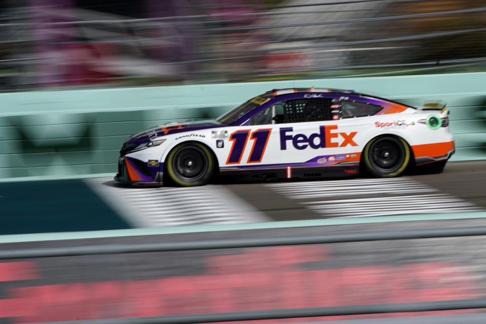 Denny Hamlin (11) drives during NASCAR Cup Series practice at Homestead-Miami Speedway, Saturday, Oct. 22, 2022, in Homestead, Fla. (AP Photo/Lynne Sladky)