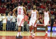 Mar 30, 2019; Houston, TX, USA; Houston Rockets guard Chris Paul (3) and center Clint Capela (15) congratulate guard James Harden (13) after he scored his 2000 career point basket against the Sacramento Kings in the second half at Toyota Center. Mandatory Credit: Thomas B. Shea-USA TODAY Sports